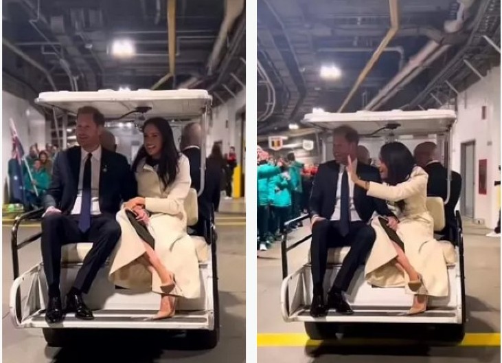 SKANDAL NAD SKANDALIMA! Princ Hari i Megan mašu iz golf kolica dok prolaze pored redova RATNIH INVALIDA na hladnoći! (VIDEO)